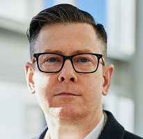 Alexander Hughes, PDG à la tête d'une société de trading crypto, portrait